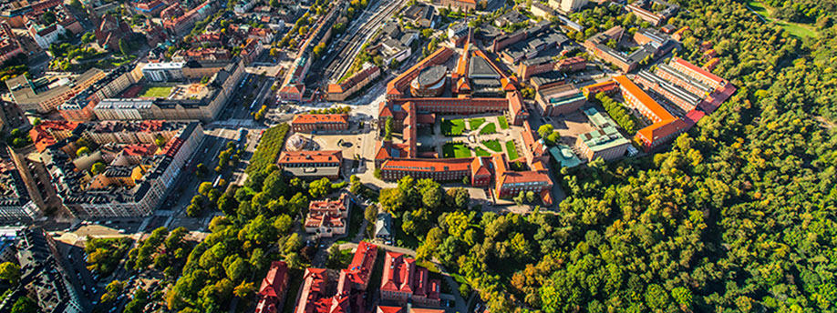 Aerial photo of KTH Campus. Buildnings and greenery.