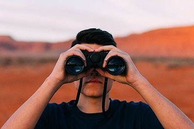 Man with binoculars