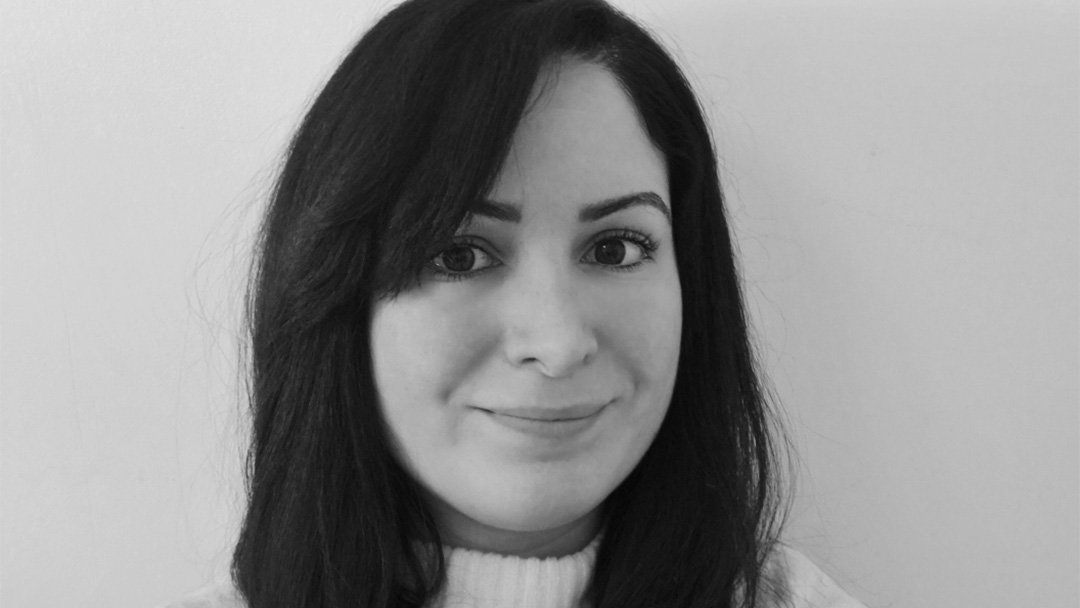 Black and white photo of woman. 