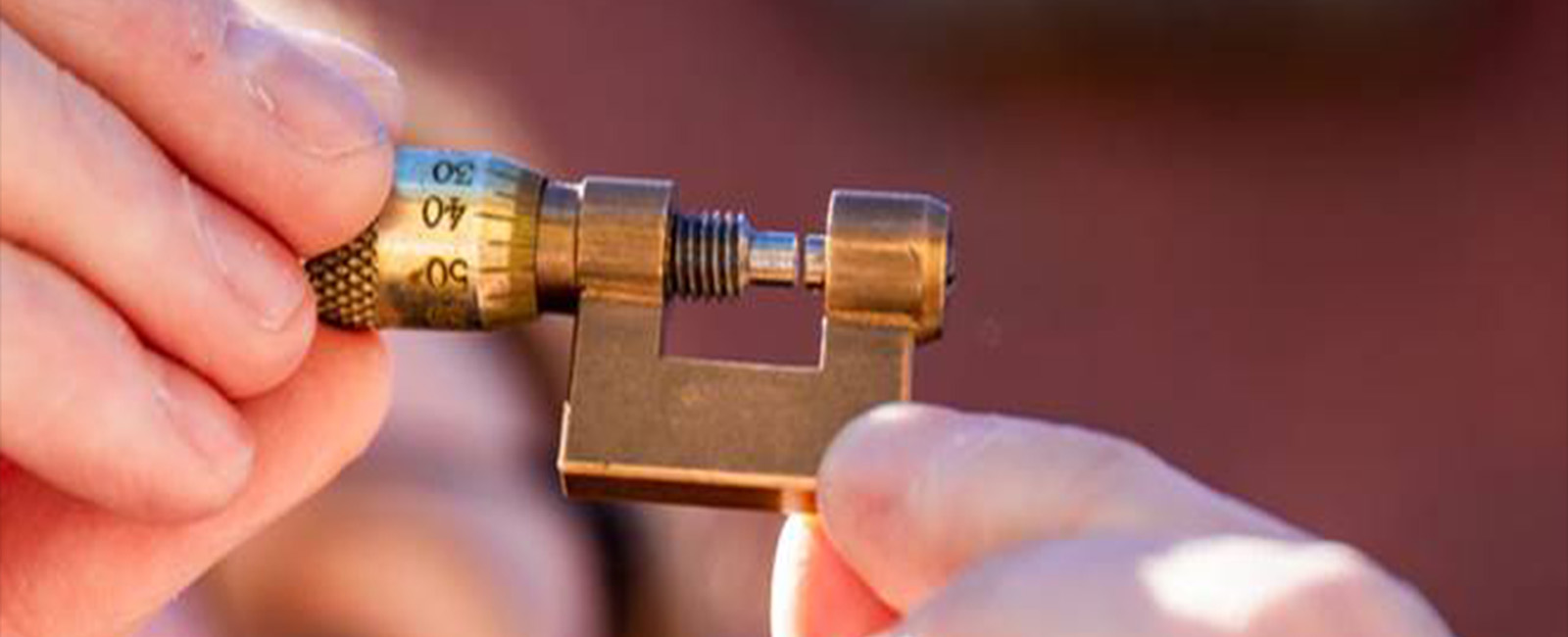 Hands with metal object