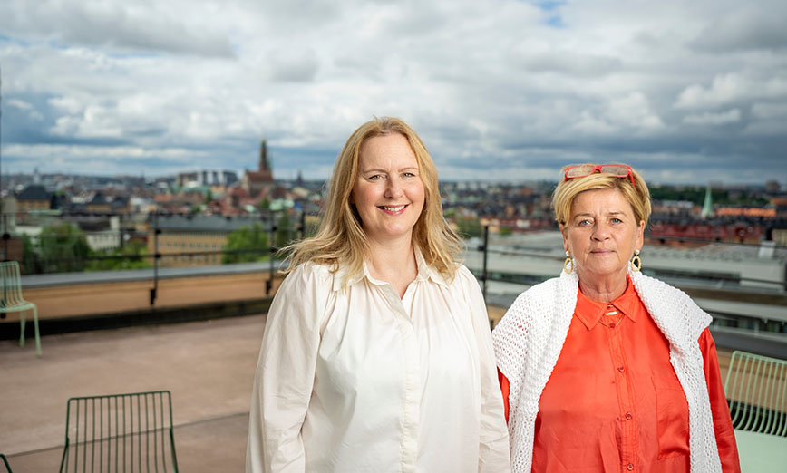 Susanne Odung and Christina Carlsson, with views from the roof terrace at Brinellvägen 8, KTH Campus
