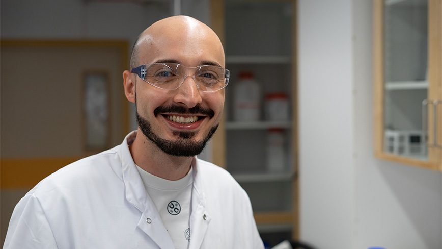 Smiling man with glasses. 