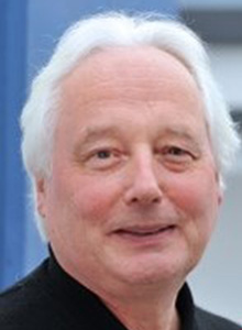 Man with white hair.