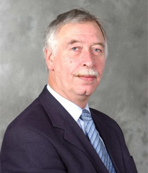 Portrait photo of George Thompson.