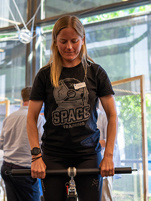 Woman using exercise machine.  