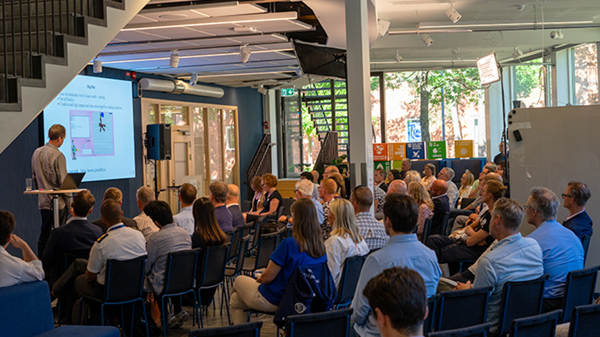 People listening to a presentation.