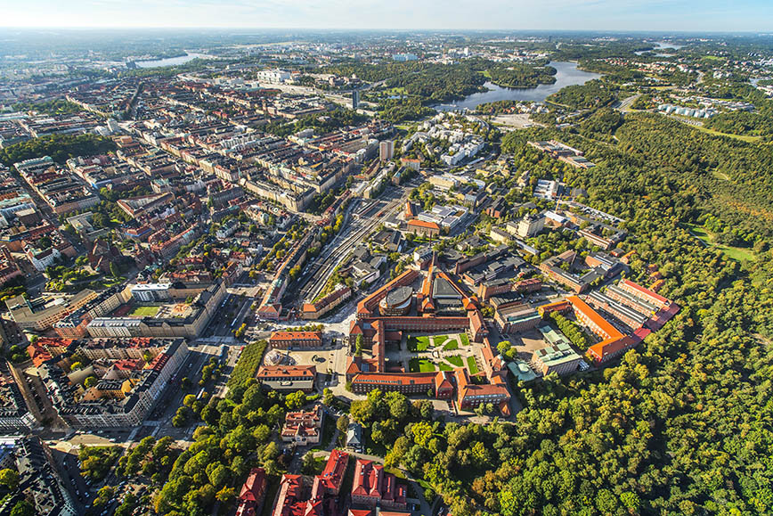 An aerial photo over KTH Campus, showing lots of buildnings and trees.