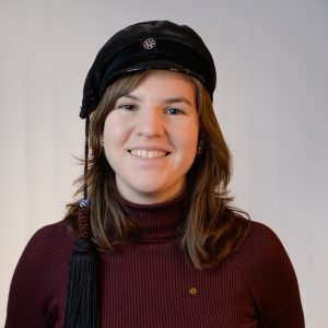 Photo: Maja Rosén with a black hat on her head.