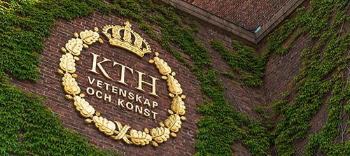 KTH logotype on brick wall.