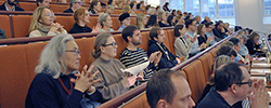 A group of people in an auditorium