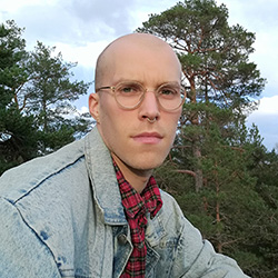 Person in googles without hair.
