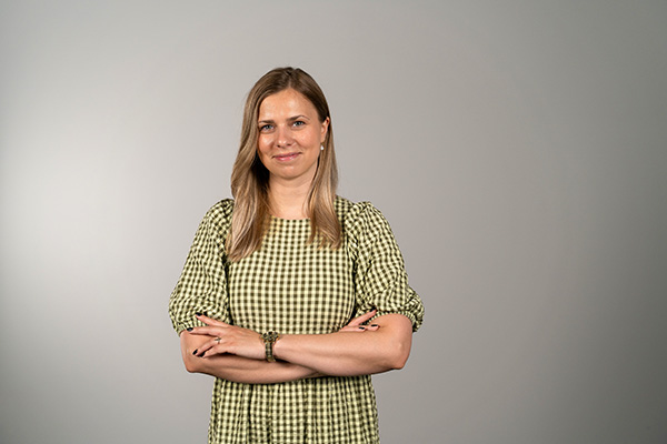 a woman in a green dress