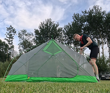 Arnd Hanisch pitching his tent for the night.