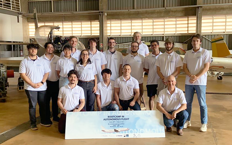 group of people in an aircraft hangar