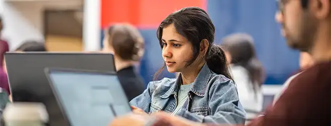 Woman in front of computer.