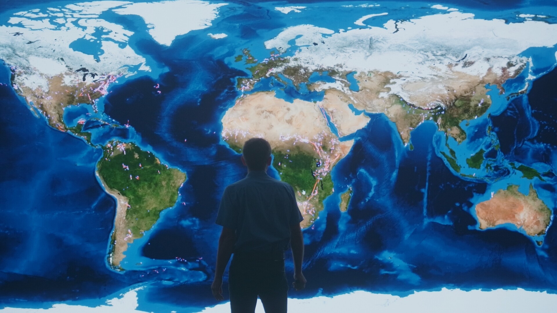 Person in front of map