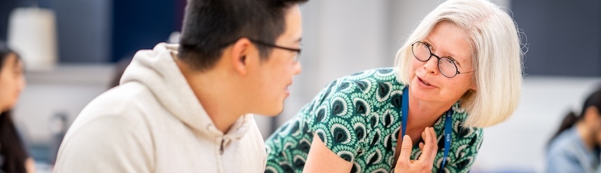 A teacher who is talking to a student.