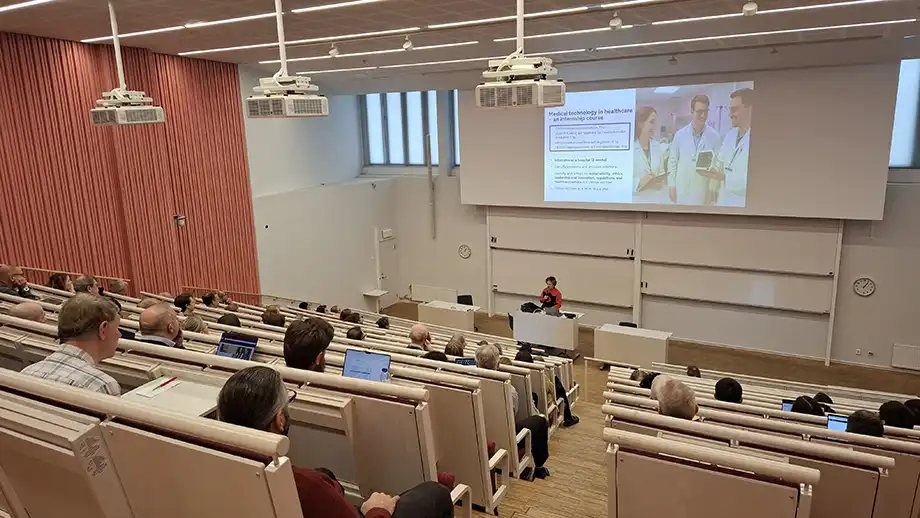 Lecture hall with audience.