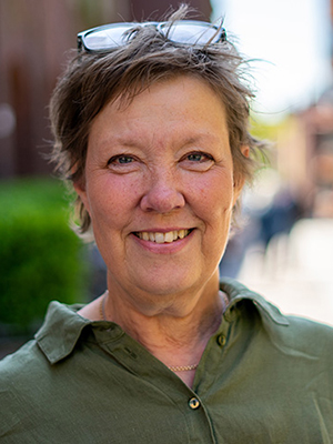 Woman in green shirt.