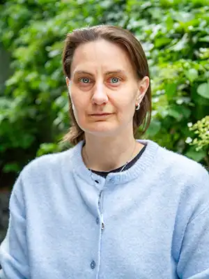 Woman i blue sweater.