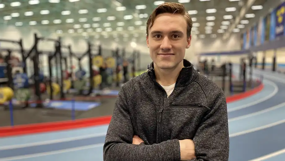 Man in an indoor sports facility