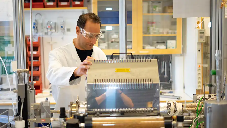 Man in a lab.