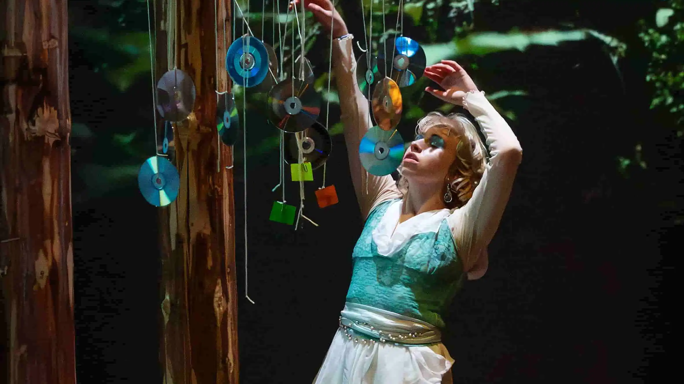 Hannah in front of a constellation of hanging CDs. Photo: Anna Gerdén