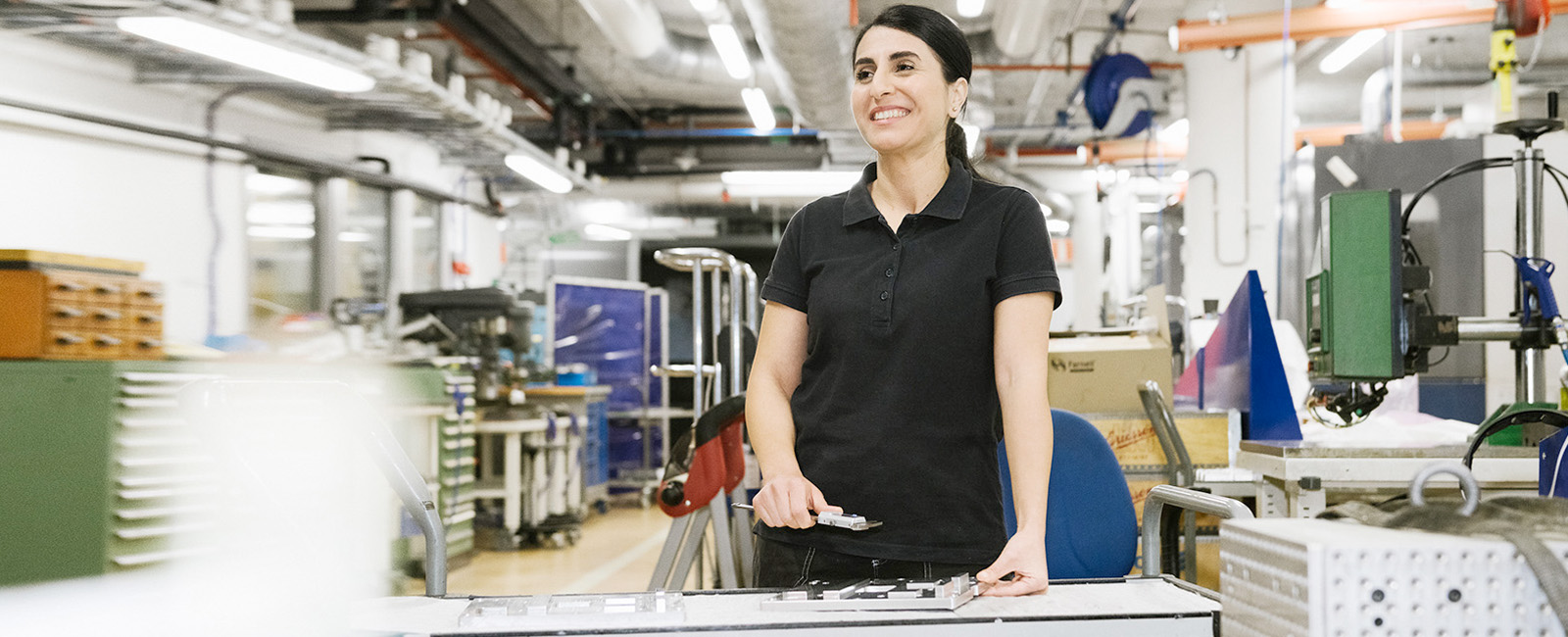 Woman in industrial setting