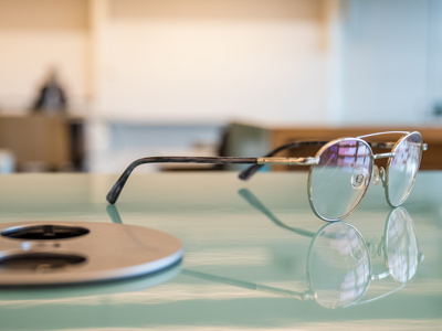 Glasses at desk in Södertälje Campus.