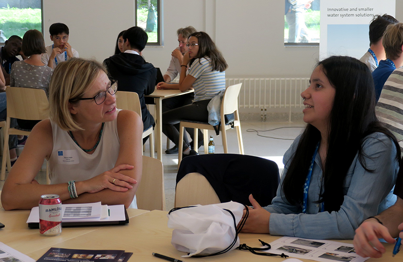 Among the researchers who spent time with the students were, Viktoria Fodor, Communication Networks at the Department for Network and Systems Engineering at the School of Electrical Engineering and Computer Science. Pictured is Professor Fodor speaking with teenage student.